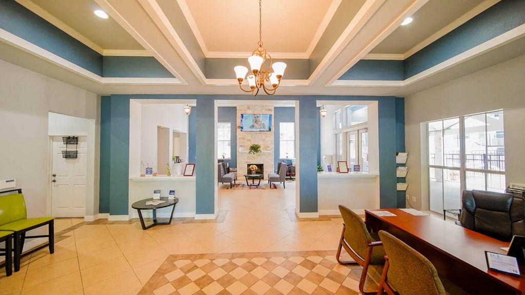 a dining room and living room with a table and chairs