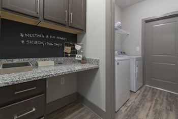 ADARA AT GODLEY STATION LAUNDRY ROOM
