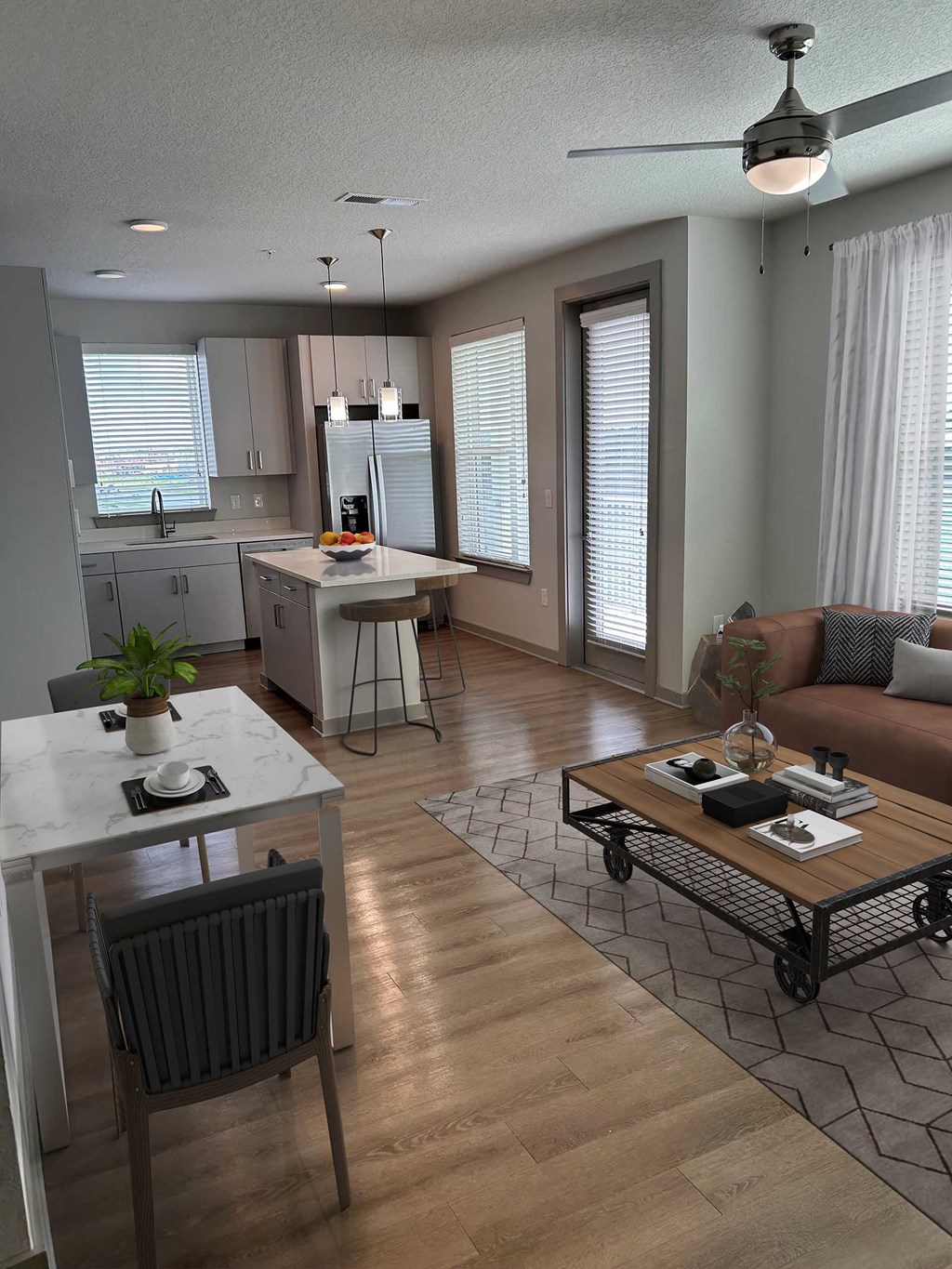 A modern living room with a dining table and a sofa.