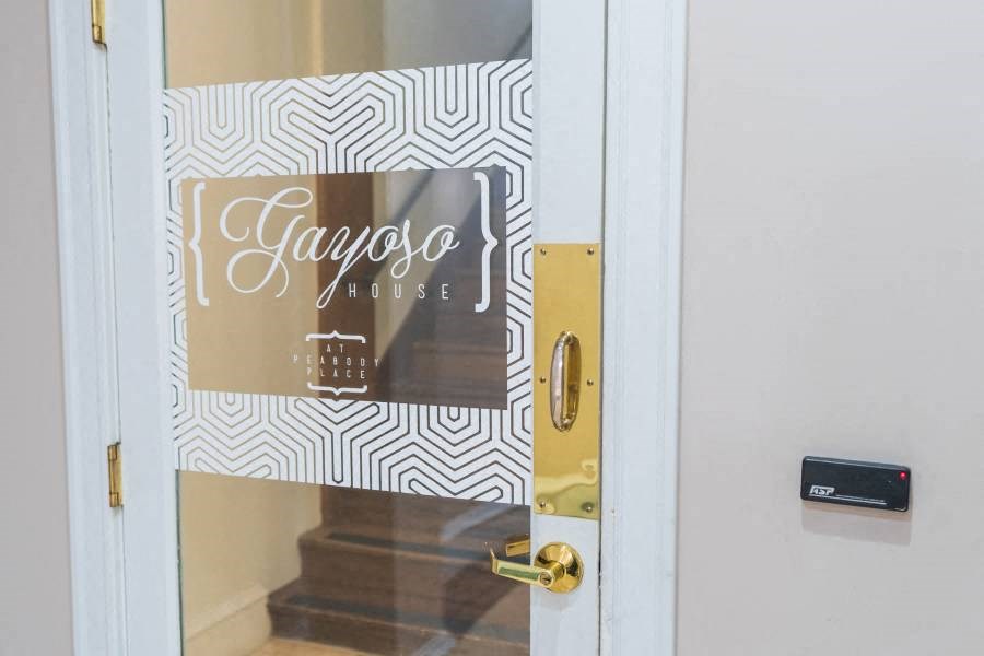 a glass door with a sign on the front of it