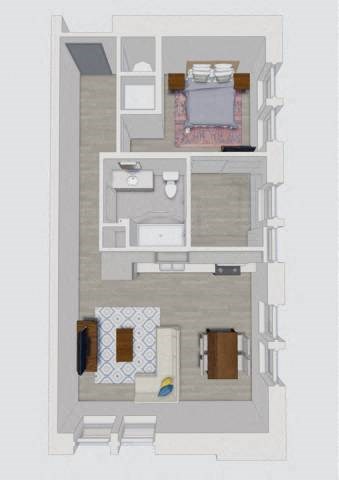 A floor plan of a small apartment with a kitchen, living room, and two bedrooms.