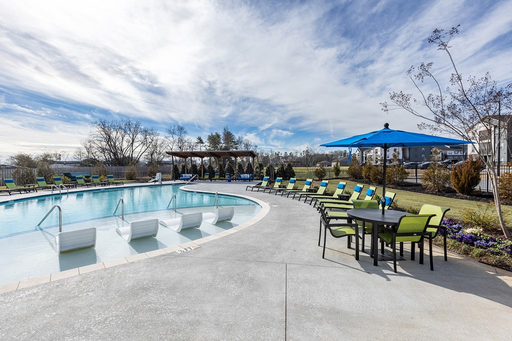 the swimming pool at the preserve at polo towers apartments