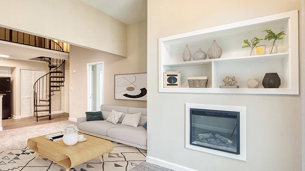 a living room with a fireplace and a couch