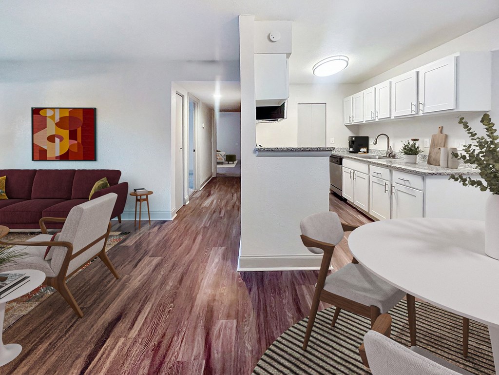 a living room with a kitchen and a dining room