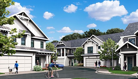 A row of houses with people walking and riding bikes in front.
