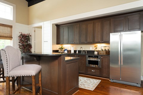 a kitchen with stainless steel appliances and a counter top