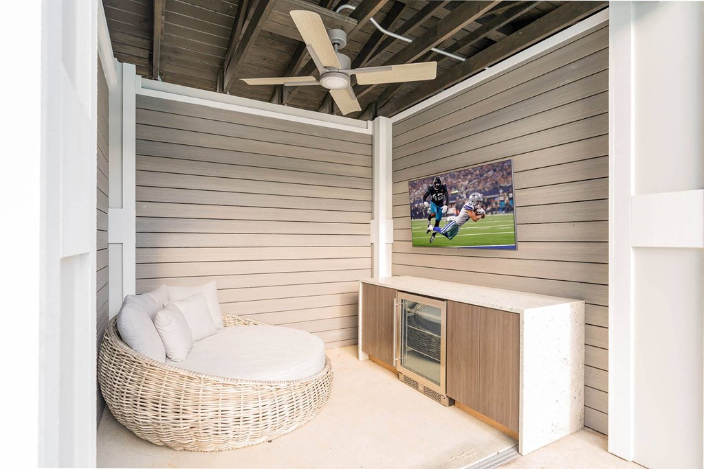 a living room with a couch and a tv