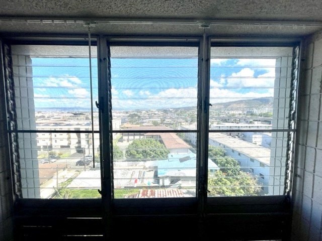 a large window with a view of a city