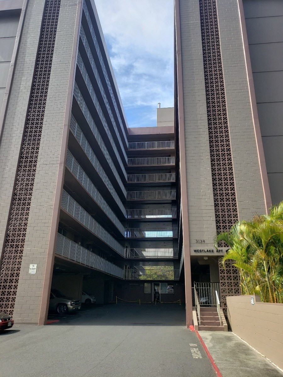 a view of the building from the parking lot