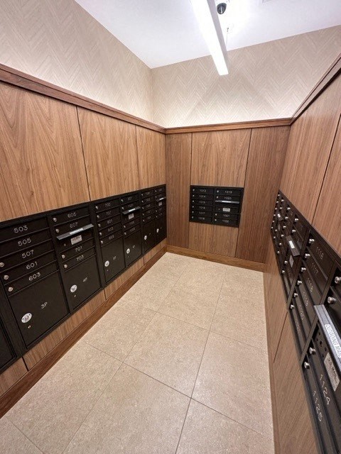 a large room with a bunch of mailboxes in it