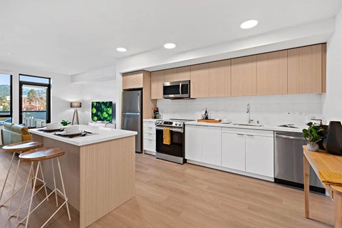 a kitchen with a counter top and a sink