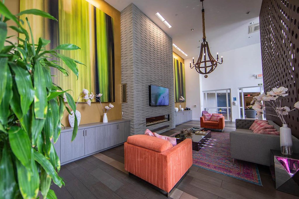 a living room with a couch and a tv