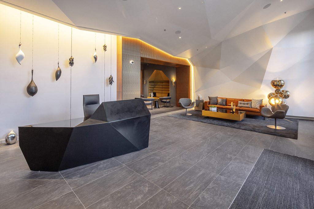 a living room with a couch and a table