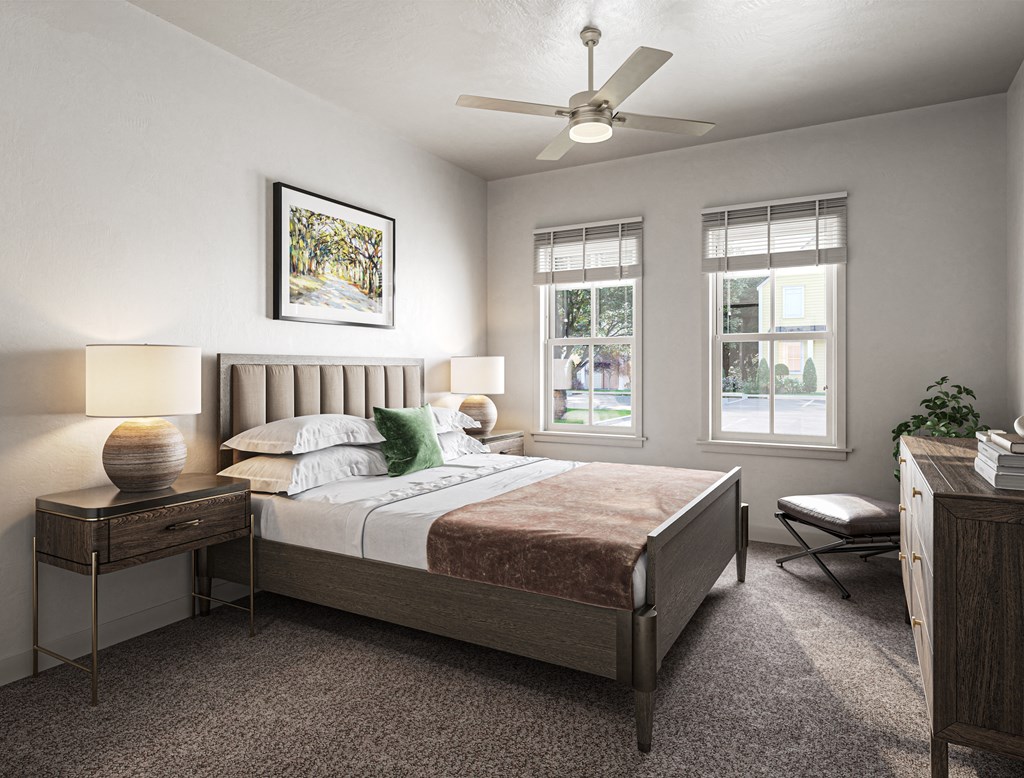 a bedroom with a bed and a ceiling fan