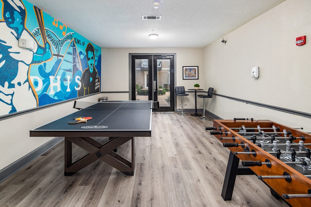 our games room has a ping pong table and a foosball