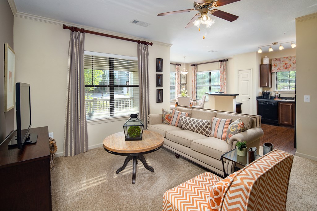 a living room with a couch and a table
