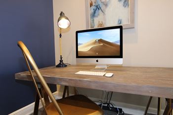Business Center featuring both Mac and PC Computers