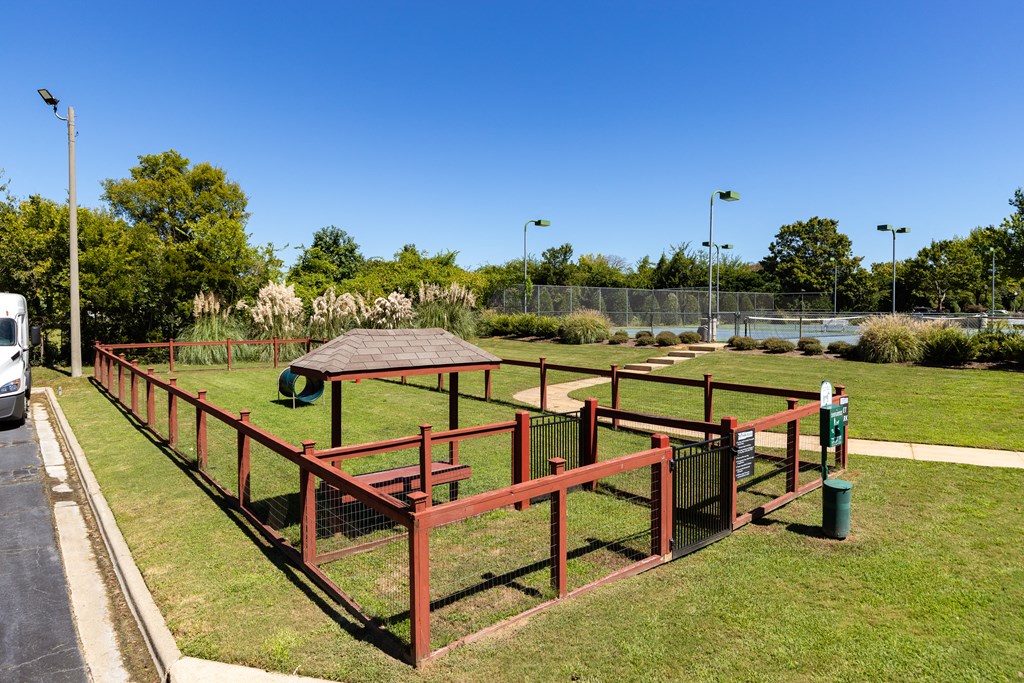 a playground at a park with a picnic table