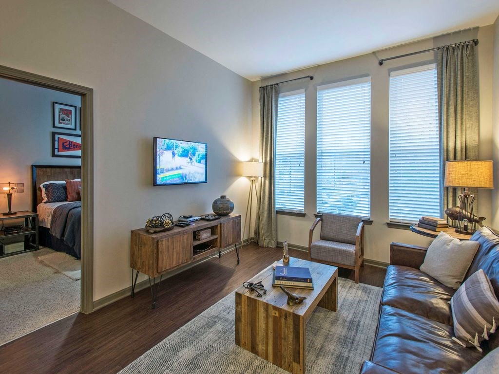 a living room with a couch and a table