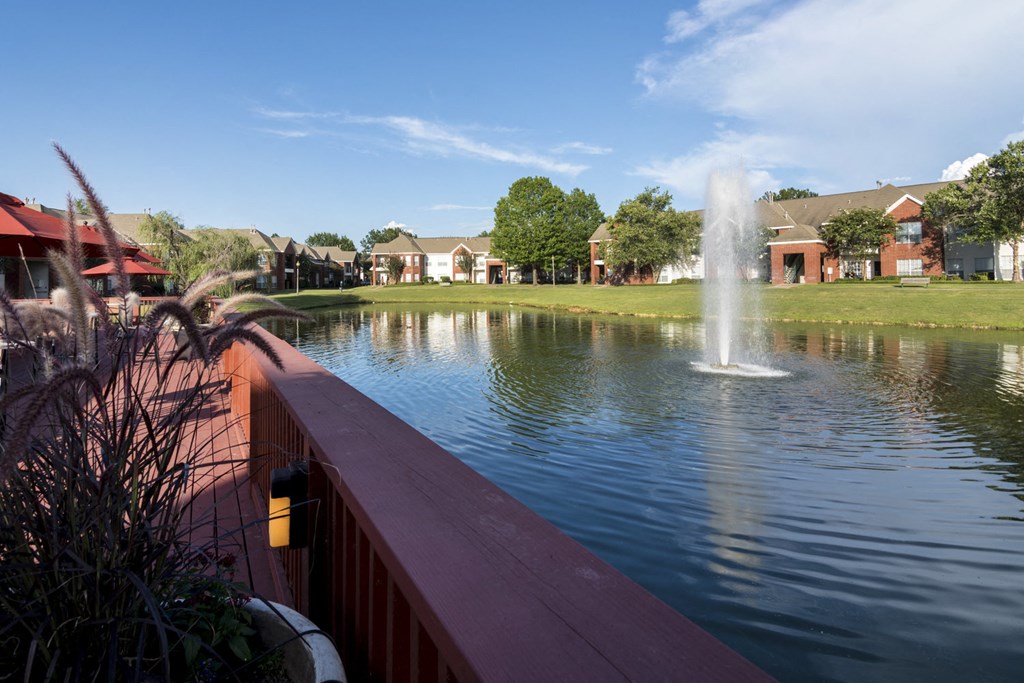 a view of a pond with a fountain