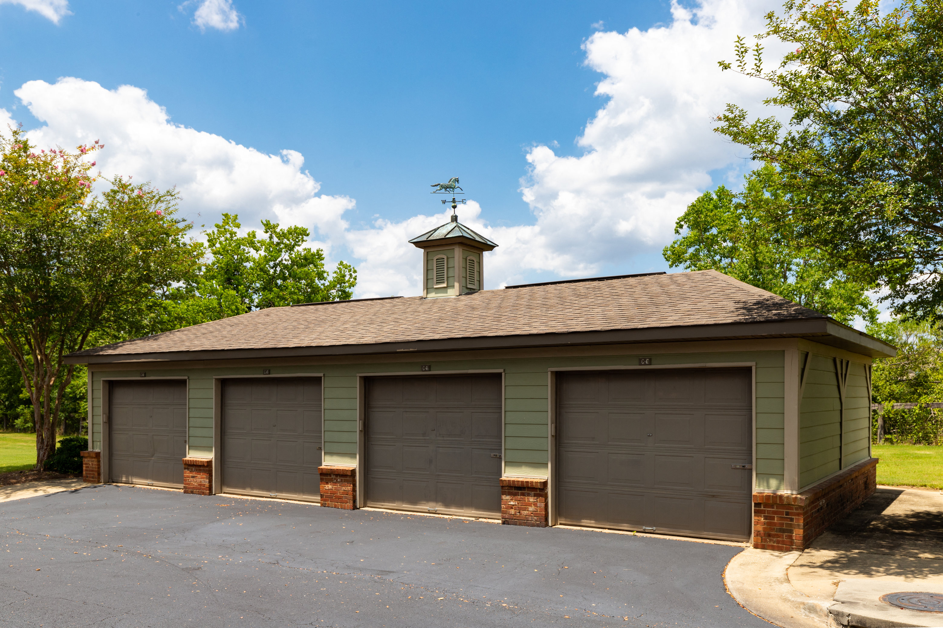 a garage with a church steeple on top of it