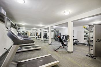 the gym at the flats at big tex apartments