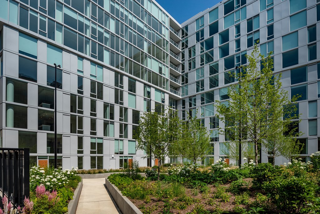 south elevation with walkway and raised garden at the citizens apartments in columbus oh