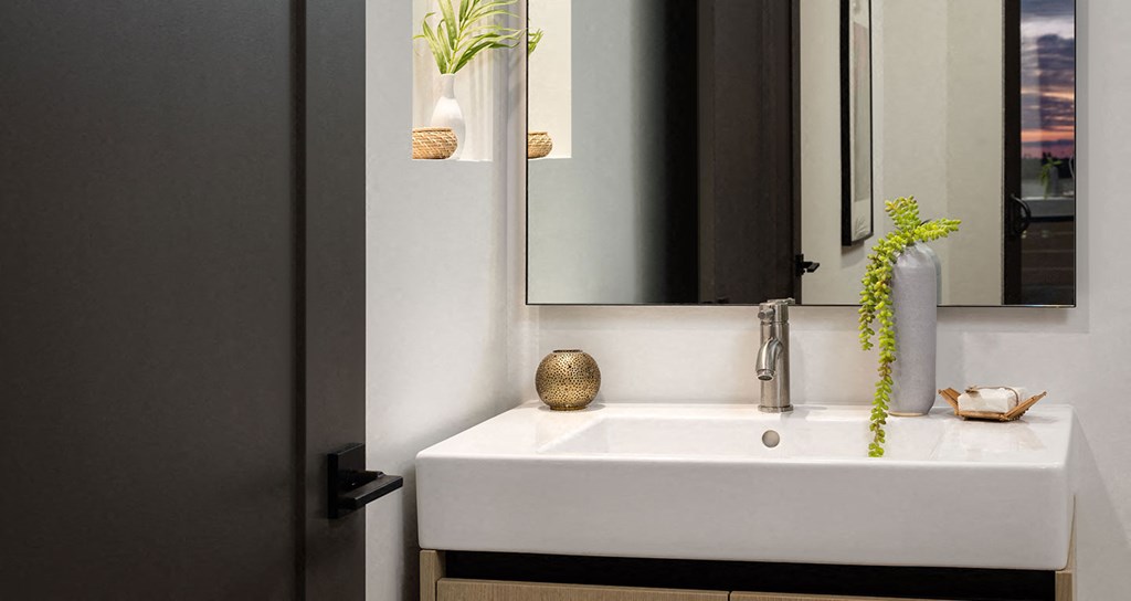 Bathrooms with beautiful built-ins and lighting