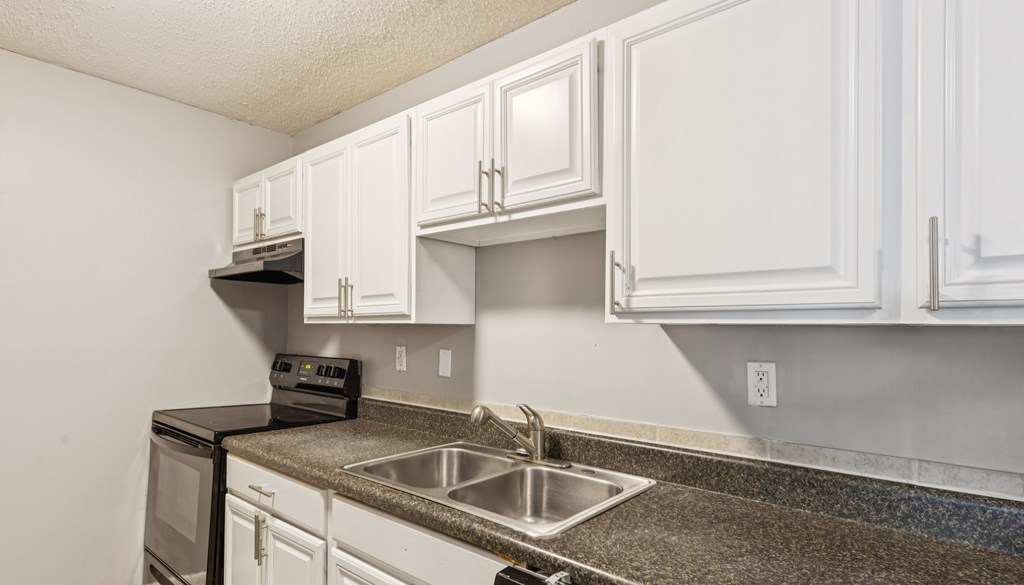 A classic kitchen with white cabinets