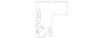 A floor plan of a room with a kitchen area and a bathroom.