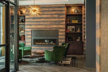 Cozy Relaxing Library Room With Books And Fireplace Cozy Relaxing Library Room With Books And Fireplace at Holmes Beverly, Beverly, 01915 - Photo Gallery 2