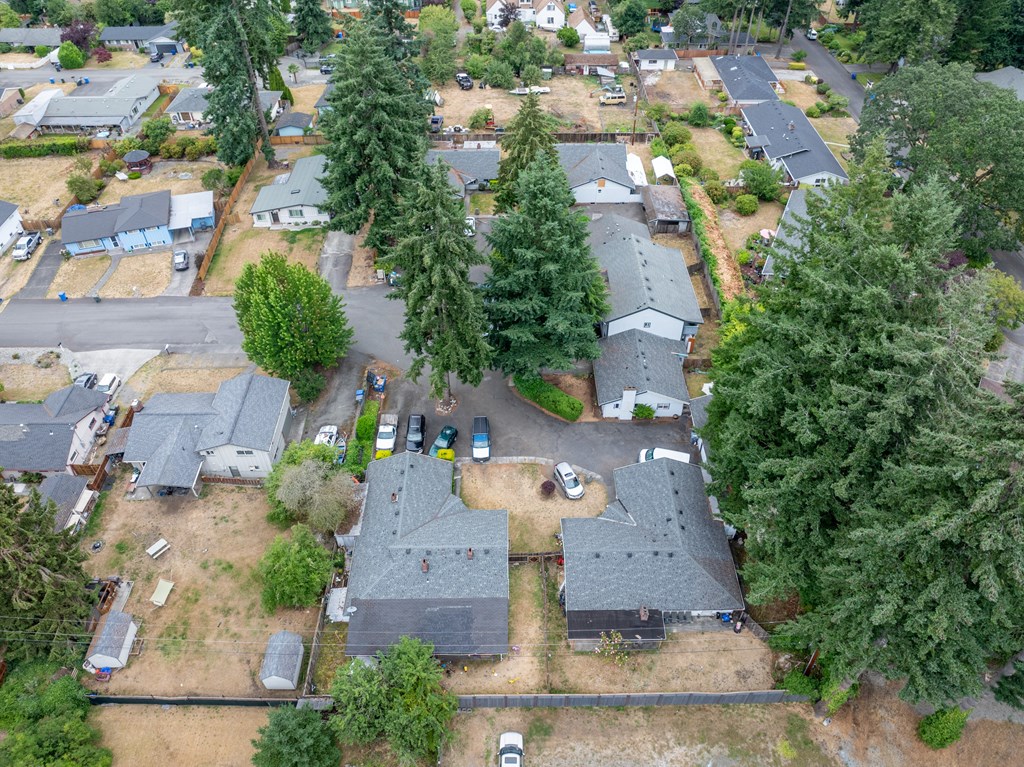 A residential area with houses and trees.