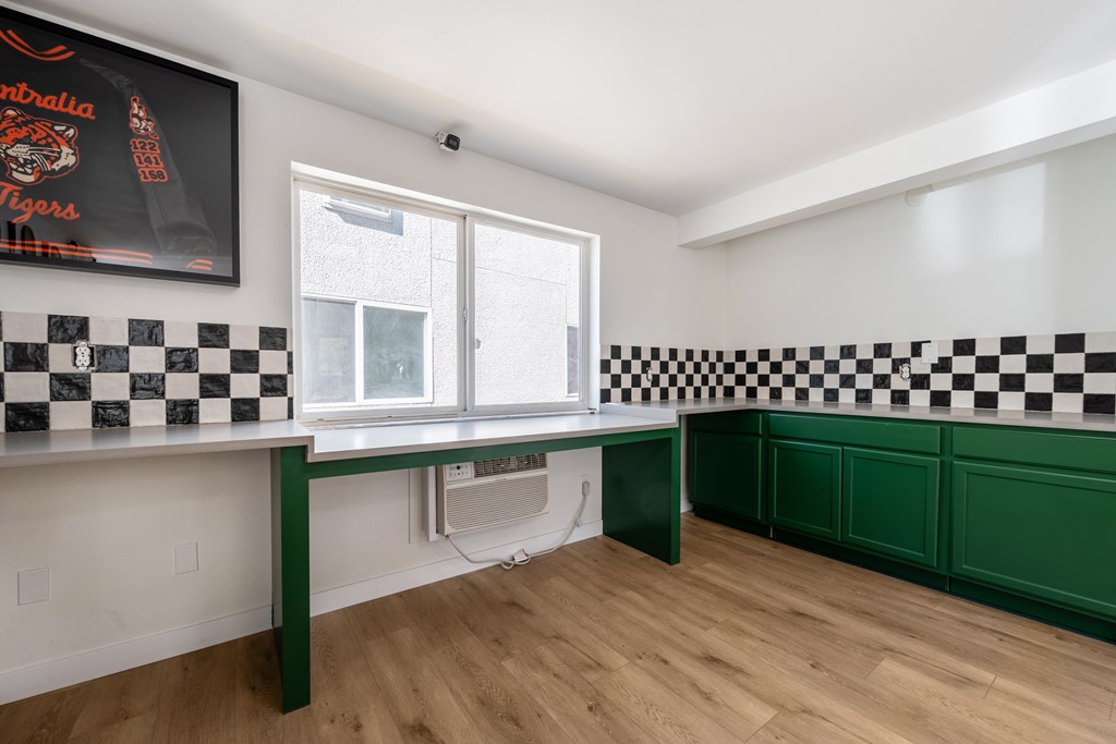 A room with a checkered black and white floor.