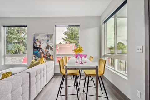 Dining room and spacious kitchens at Alta Crossing Apartments.