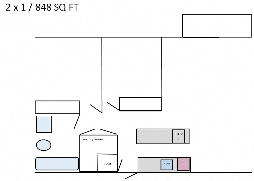 a floor plan of a room with furniture and a bathroom