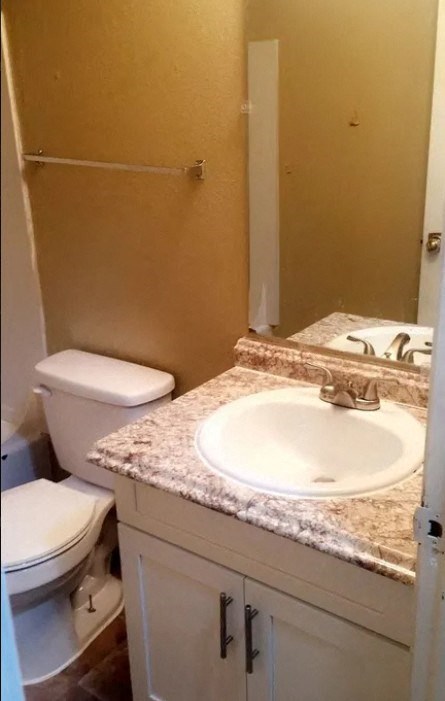 a bathroom with a sink and a toilet