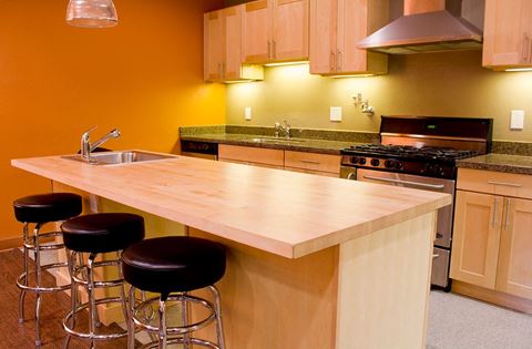 a kitchen with a wooden counter top