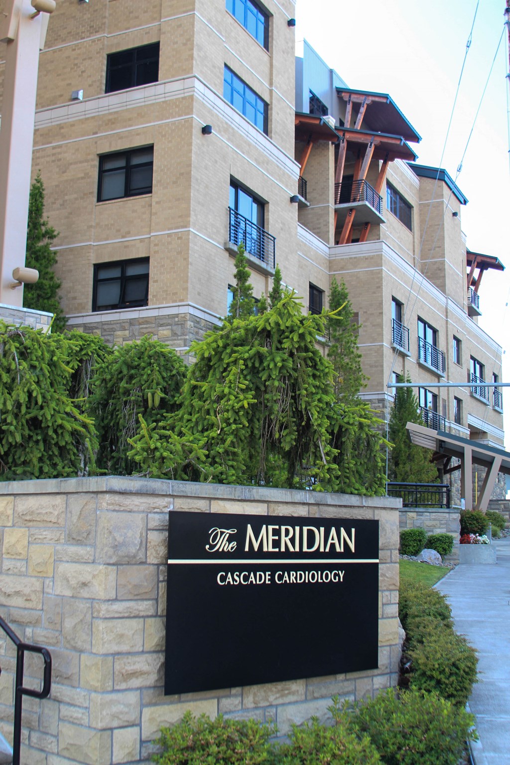 an exterior view of the meridian cascade condominium building