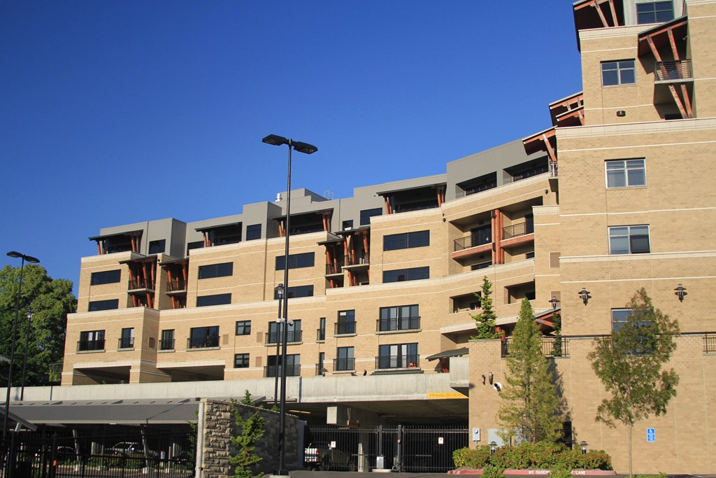 a large building with a street light in front of it