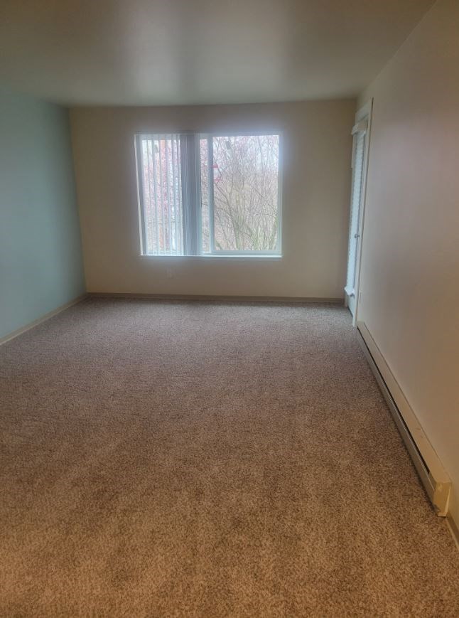 a empty room with a window in it