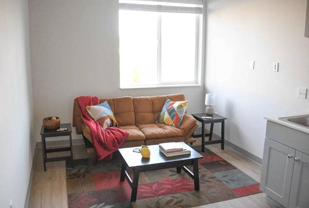 a living room with a couch and a coffee table