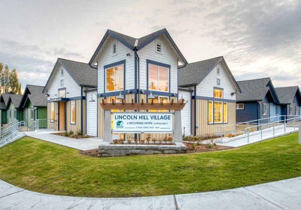 A housing development named Lincoln Hill Village is showcased in the image.