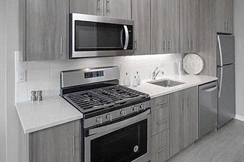 Alberta Arts Neighborhood, Floor to Ceiling Windows, Stainless Steel Appliances, Quartz Countertops, Washer and Dryer in Each Apartment Home