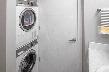 Alberta Arts Neighborhood, Floor to Ceiling Windows, Stainless Steel Appliances, Quartz Countertops, Washer and Dryer in Each Apartment Home