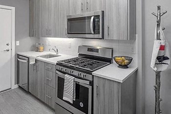 Alberta Arts Neighborhood, Floor to Ceiling Windows, Stainless Steel Appliances, Quartz Countertops, Washer and Dryer in Each Apartment Home