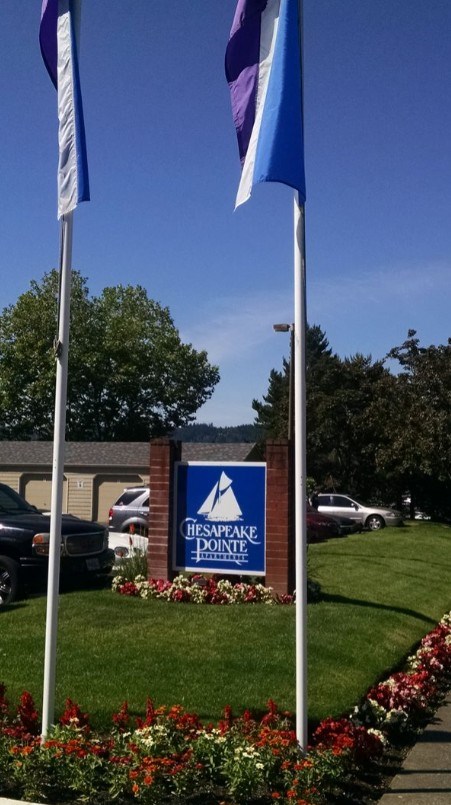 A sign for Hesapeake Dorite is displayed in front of a building.