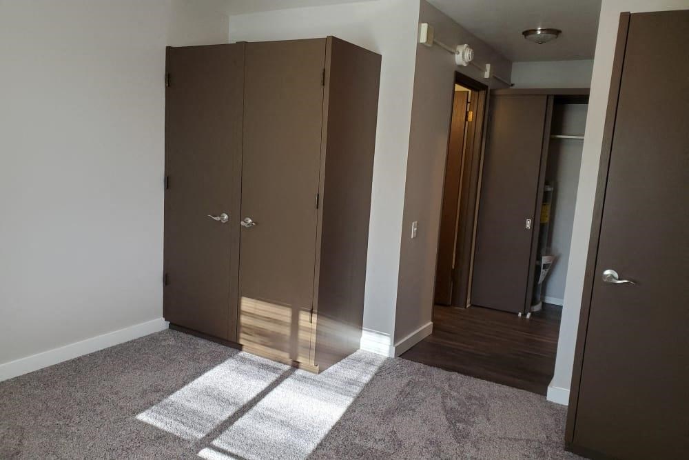 a row of closet doors in a room