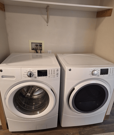 a washer and a dryer in a laundry room