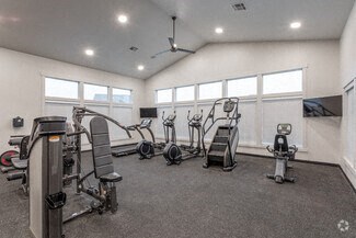 fitness center Fitness center with weights and cardio