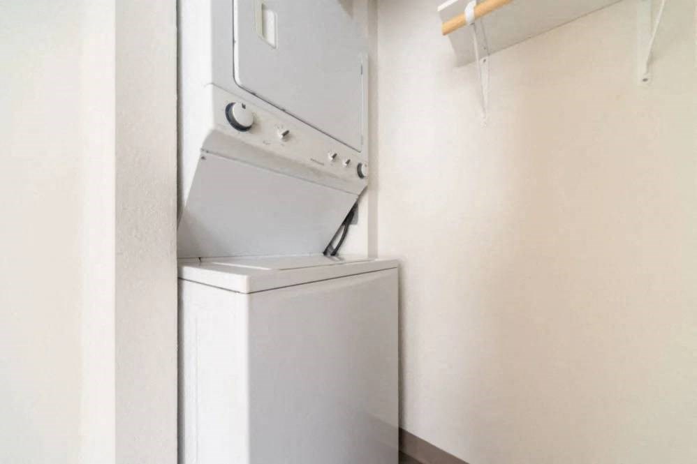 A white dishwasher is installed in a kitchen.